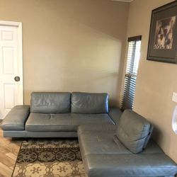 Real Leather Gray Couch - Great Condition - no tears no cuts just need a good wash  No pet or smoke home 95”c 97”c 15”