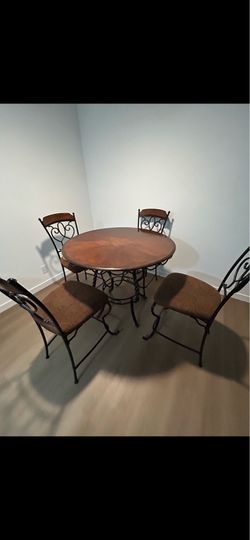 Round dining table with chairs
