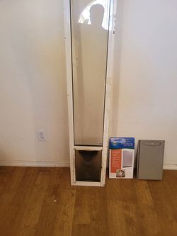 Med Dog door of sliding door  . With a new flap