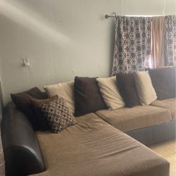 Couch With Pillows And Curtains
