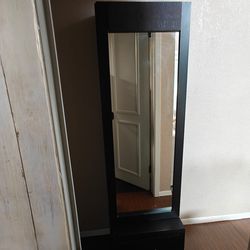 Long mirror with hidden storage
