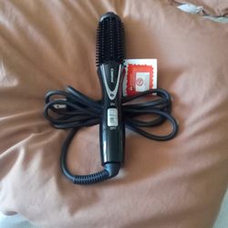 Traveling curling iron