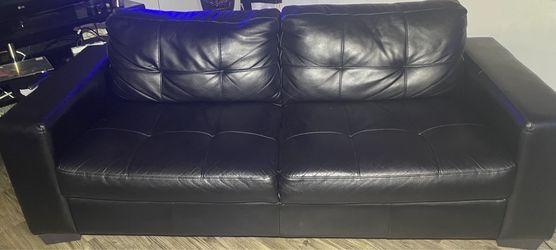 Black leather couch- 7ft long