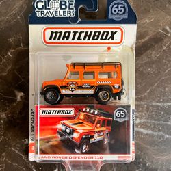 Matchbox Globe Travelers Land Rover Defender 110 - Orange - 65th Anniv.