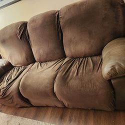 Leather -look brown reclining sofa. Very Comfy!!