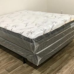 Queen Pillowtop Mattress And Box Spring. $190
