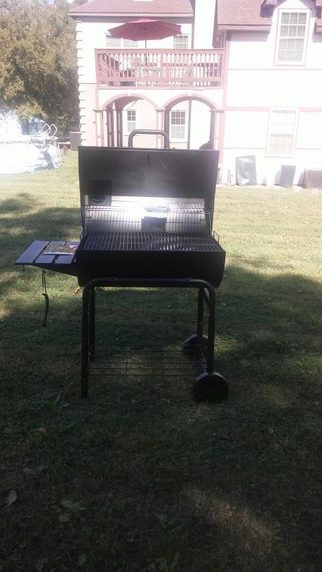 Brand-new Char-Griller Pro Deluxe model number 2727 charcoal grill and smoker