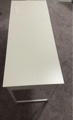 White 48” desk (BRAND NEW) (comes with outlets)