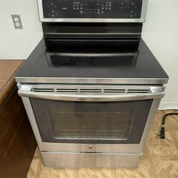 GE PROFILE GLASS TOP STOVE STAINLESS STEEL.