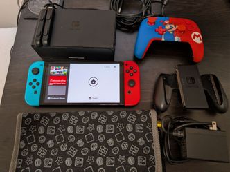 Nintendo Switch OLED Bundle with Neon Blue/Red Joy-Cons