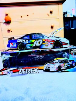 Nascar 1:24 car autographed by the narcar racer johnny benson
