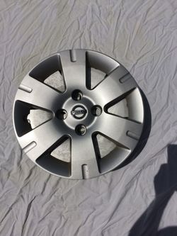4 Nissan OEM used 15" wheel cap $35