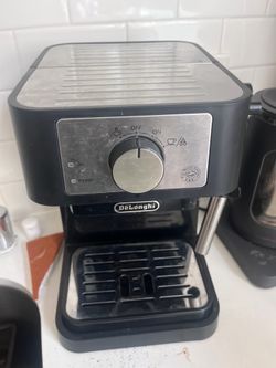 DeLonghi espresso machine- works well