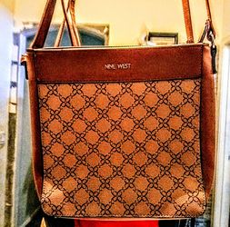 This Nine West crossbody brown monogram pattern