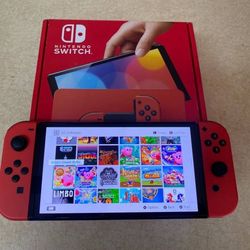 NINTENDO SWITCH OLED with 125 SWITCH GAMES AND 7000 RETRO GAMES