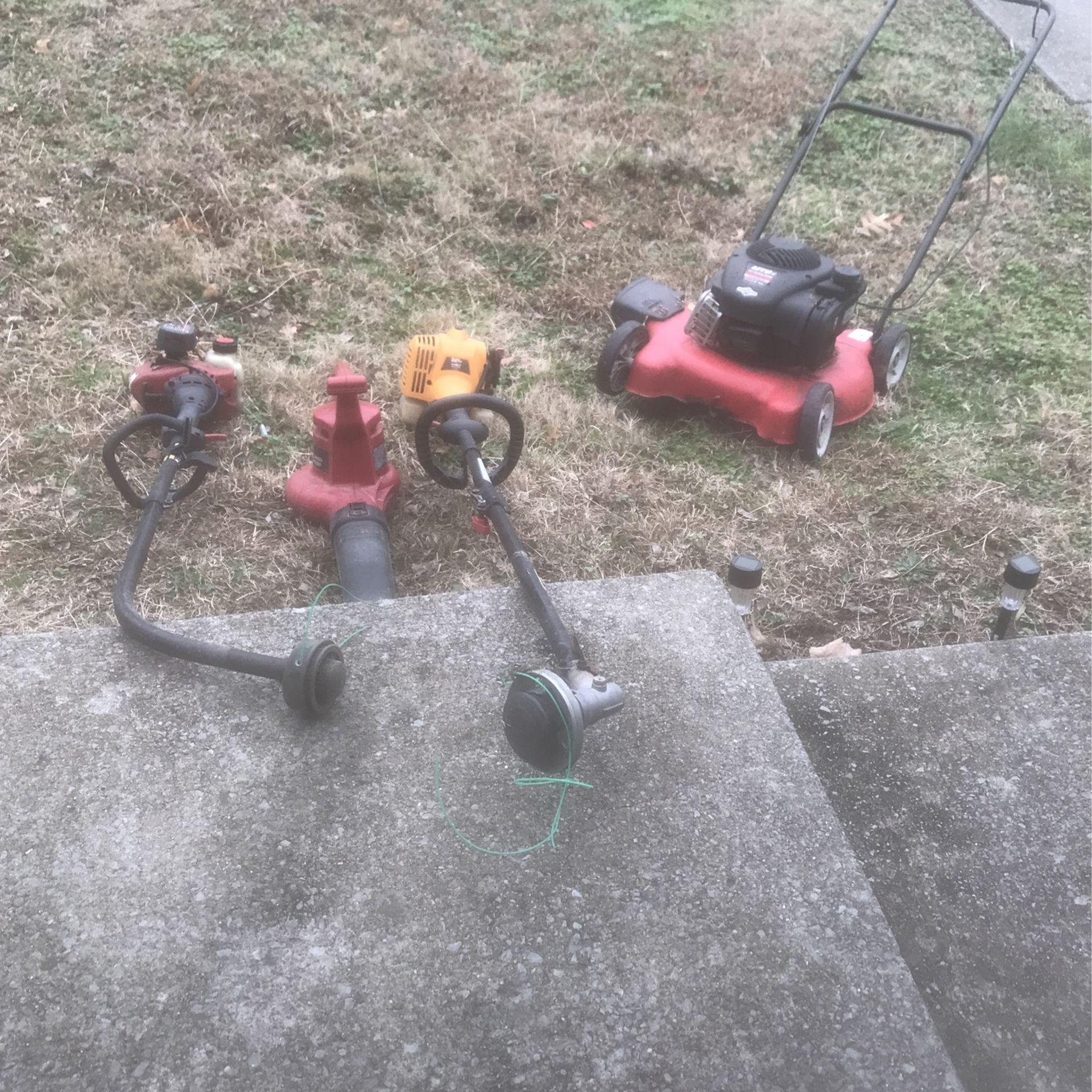 1 Lawnmower 2 Weed eaters & 1 Leaf Blower