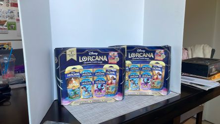 2 boxes- Disney Lorcana Trading Card Game 2 Decks 4 Booster Packs 1 Promo Card Sealed