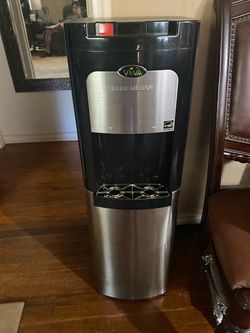 Used works nag hot cold water dispenser