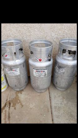 Three propane tanks