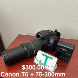 Canon T6 + 75-300mm lens $300.00