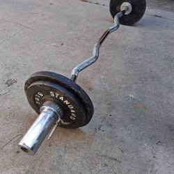 olympic barbell exercises with 30 lb weight plates - $80