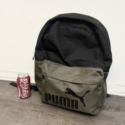 Puma Backpack • black and olive grey •Padded mesh straps,zip closure, adjustable straps, and exterior bottle pocket •Clean, in excellent condition 