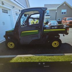 John Deere GatorXuv 835m W/ 6' Plow And Spreader