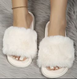 Pantuflas blancas número “9”