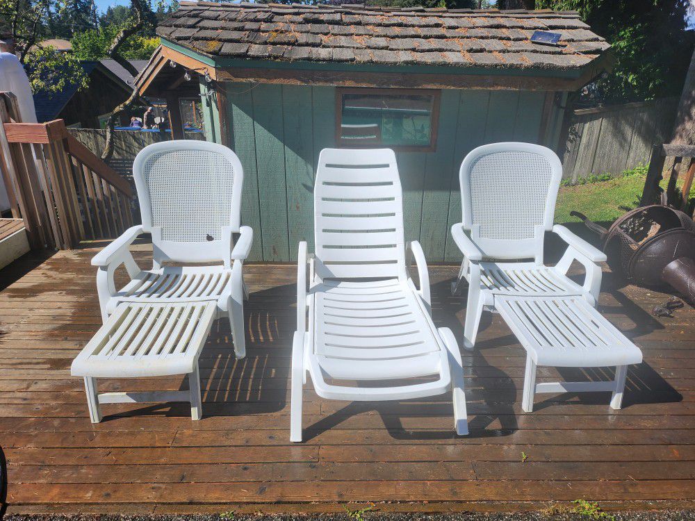 3 Plastic Lounge Chairs