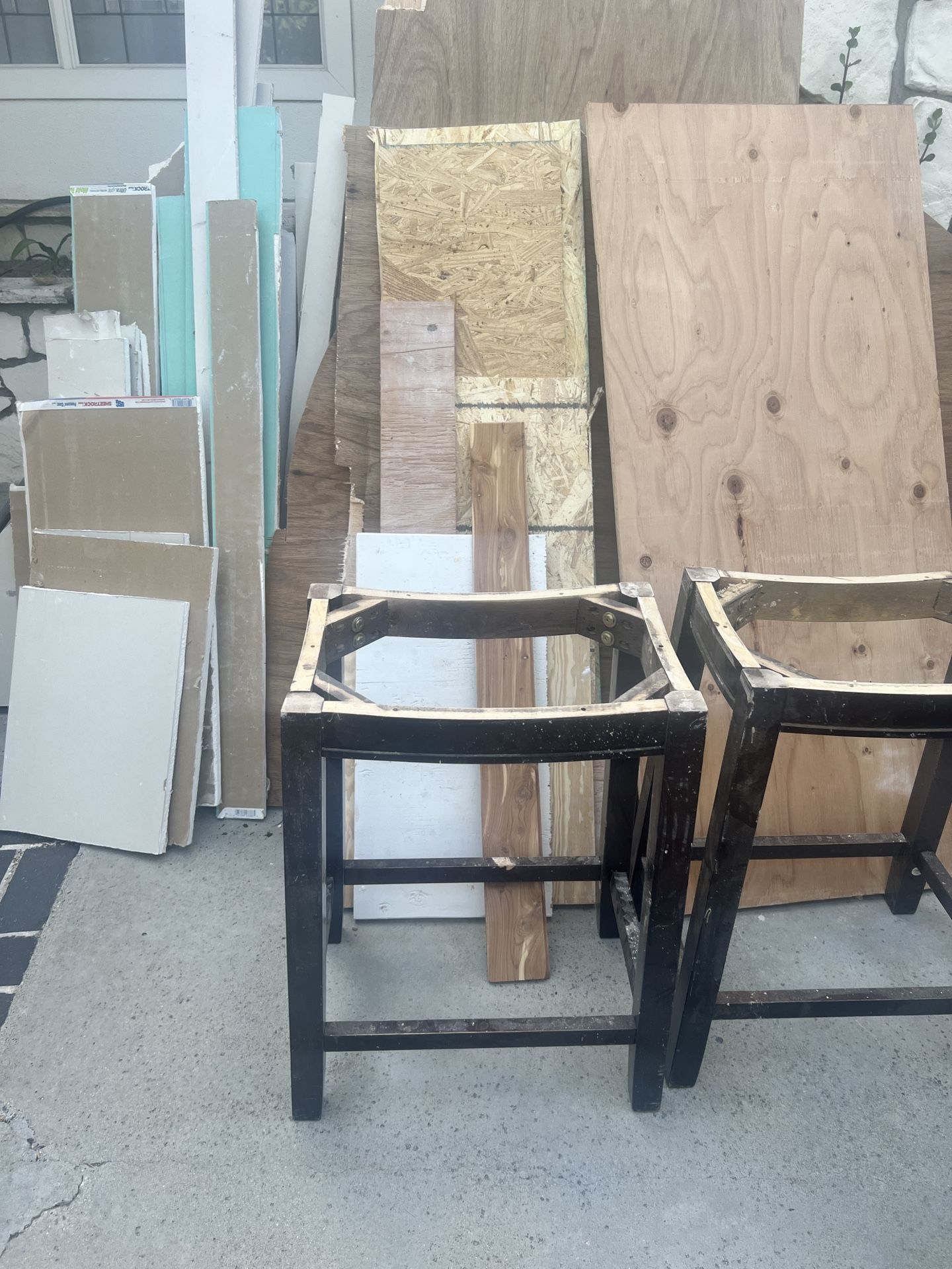 Scrap wood and drywall pieces