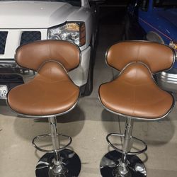 Two leatherette Airlift Adjustable Swivel Barstool