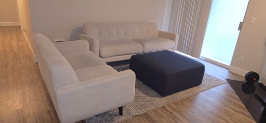 Hadley Tufted Back Sofa and Loveseat, Taupe. With rug and ottoman