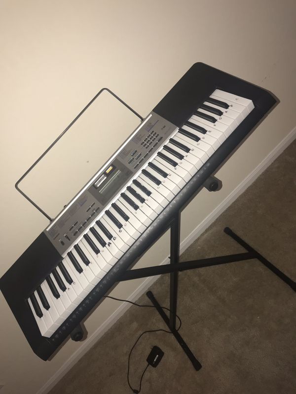 Piano keyboard with stand and some pre labeled letters- Casio LK-175 for Sale in Humble, TX ...