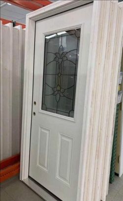 White Exterior Door with Decorative Glass Insert