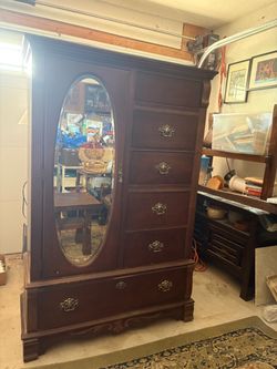 Mirrored wood armoire