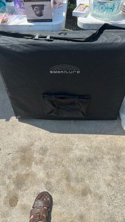 Massage table