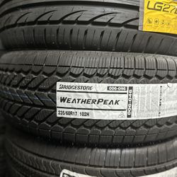 235/60/17 Bridgestone Weatherpeak NEW TIRE INSTALLED