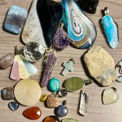 Pretty stones, pendants and trinkets. All different colors and sizes. As is. No returns. Make me an offer I can’t refuse. Please feel free to ask any 