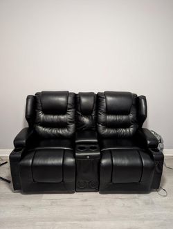 Leather theater style power reclining couch