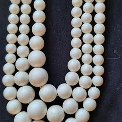 signed HONG KONG triple strand ivory color graduated plastic bead necklace