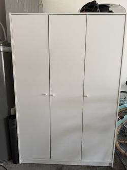 Three-door wardrobe