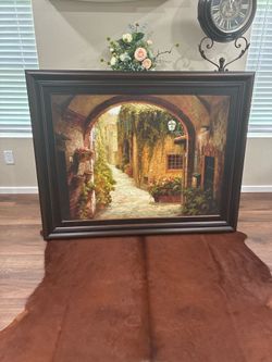 Kirkland’s framed street scene painting
