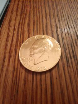 1976 vintage golden Eisenhower bicentennial dollar