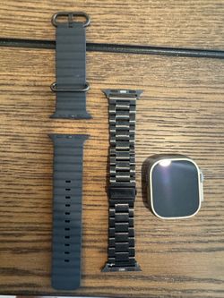 Apple Watch Ultra 2 (GPS and Cellular) 49mm Titanium case with Black Ocean Band - Color Natural