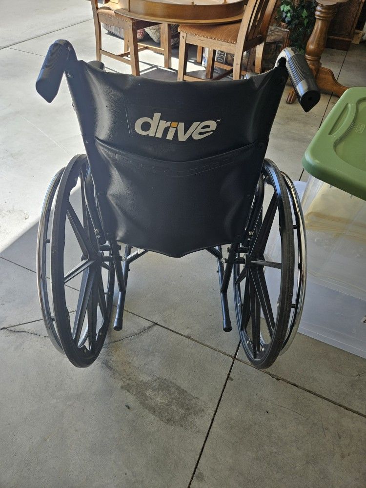 Wheel Chair With Easy Fold And Lift Of Ease.