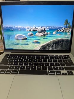 2022 MacBook Pro Laptop M2 and 16GB RAM and 256GB SSD. Comes with power adapter and AppleCare+ warranty until September.   Great condition, no issues.
