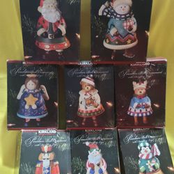 PORCELAIN  BELL ORNAMENT  WITH DANGING LEGS  8 BOXES BRAND NEW SELLING TOGETHER 