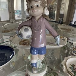 Lilly Football Player porcelain figurine by Lladro