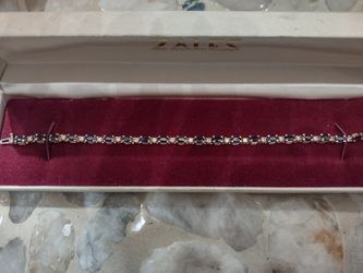 21 Round Diamonds and 21 Safires In 18k Gold Bracelet