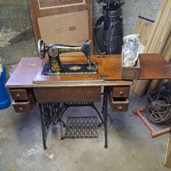 2 Old Singer Sewing Machines